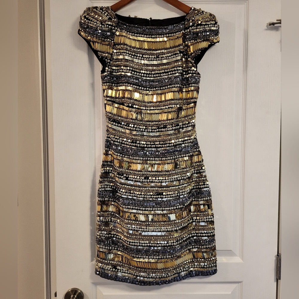 Talitha black and gold beaded cocktail dress in size XS.